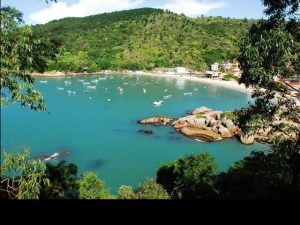 A small fishing village is tucked below the breakfast terrace at Ponta dos Ganchos. The resort employs and trains more than 200 people from the local area.