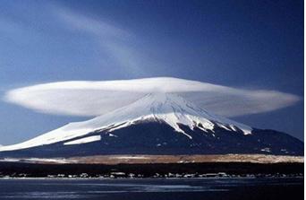 ncredible lenticular cloud formation on the top of this mountain