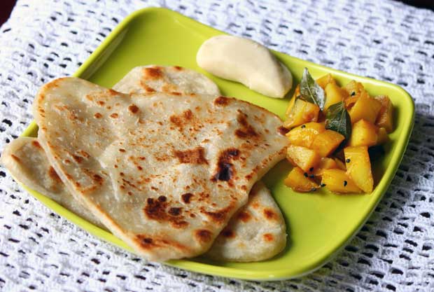 Tuck into a hearty stack of parathas in India